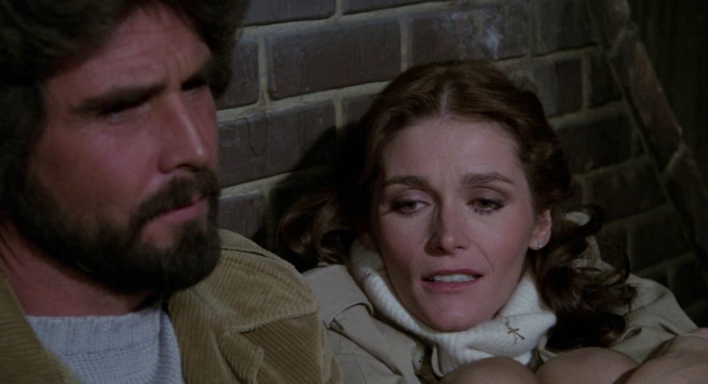 George Lutz (James Brolin) and his wife Kathy (Margot Kidder) in Stuart Rosenberg’s adaptation of The Amityville Horror (1979).