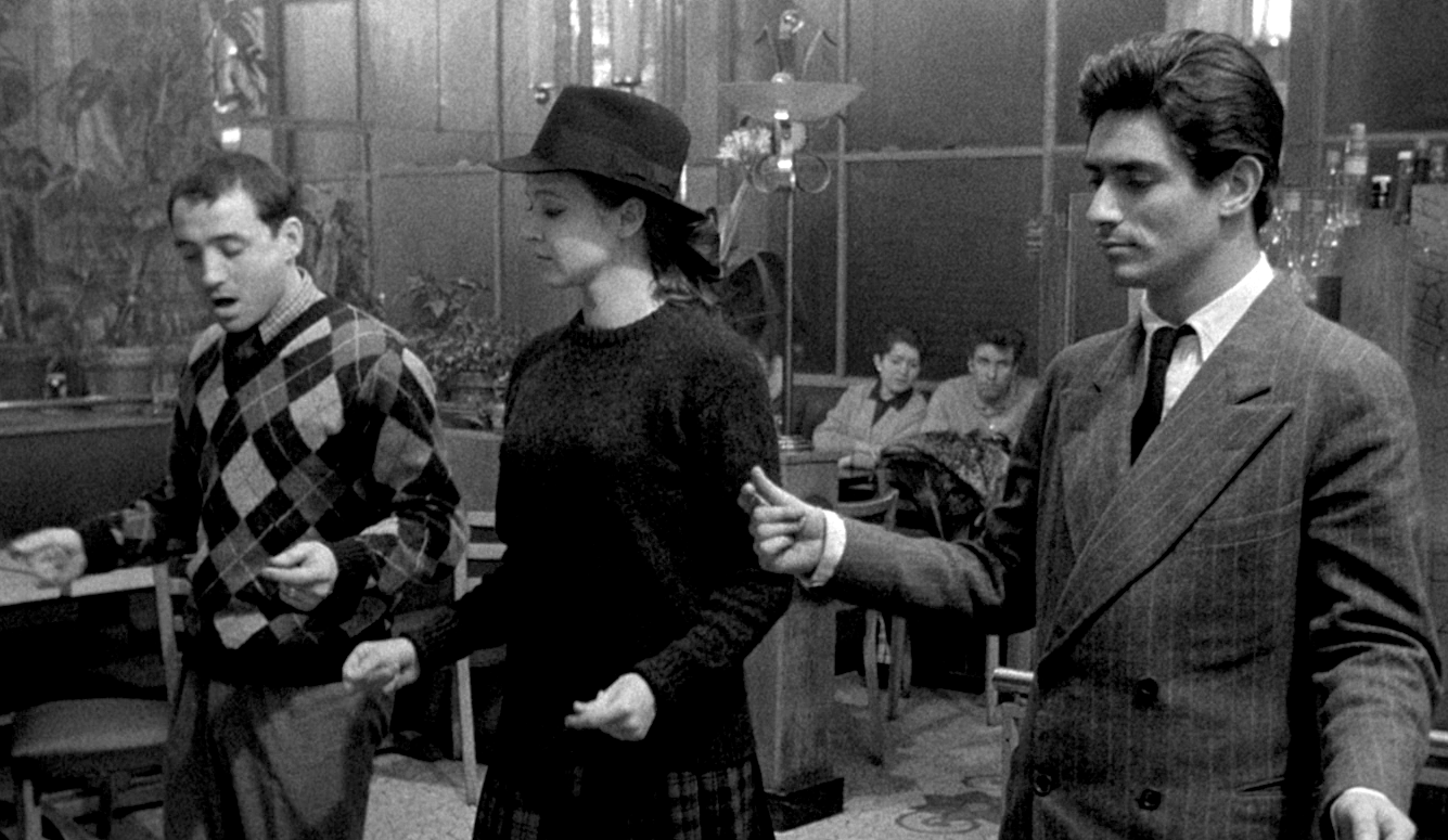 A woman and two men, snapping their fingers. Image from Band à Part (Jean-Luc Godard, 1964)