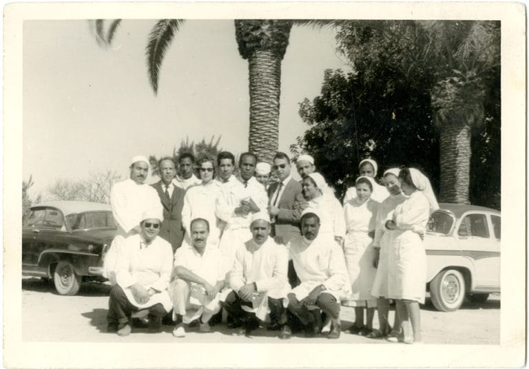 A photo of Frantz Fanon and his medical team at the Blida-Joinville Psychiatric Hospital in Algeri