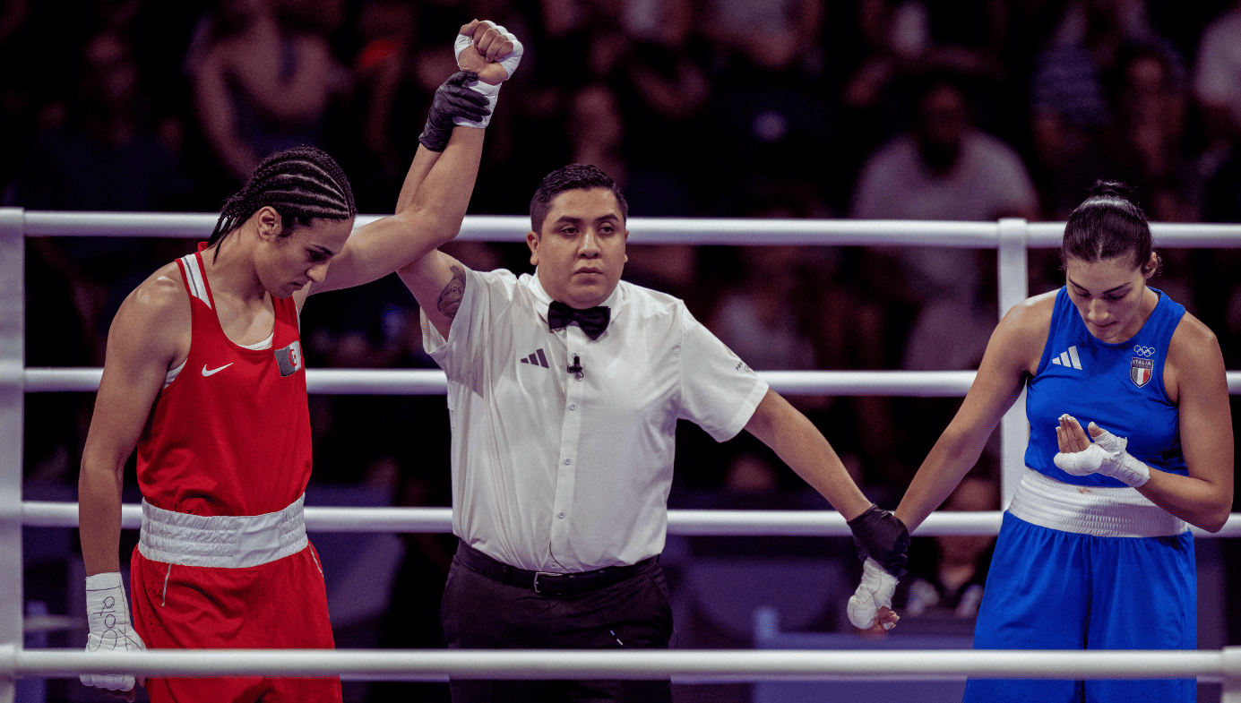 Algeria's Imane Khelif (in red) and Italy's Angela Carini during their women's 66kg preliminaries round