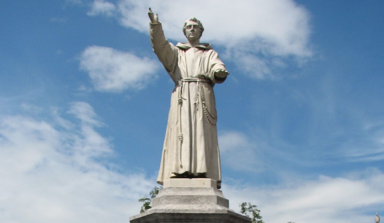 A statue of a Catholic monk. 