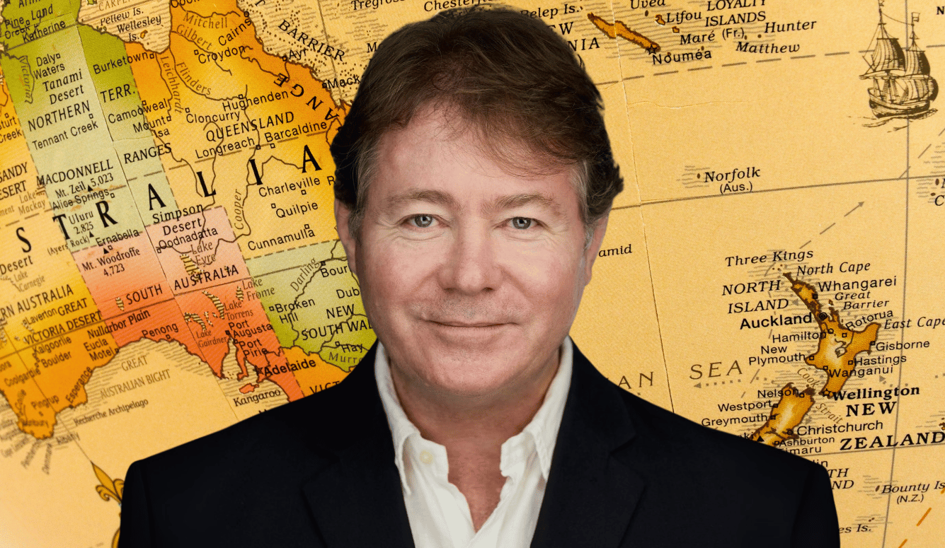 Sean Welsh is a white man in his 50s. Background of sepia map of Australia and New Zealand.