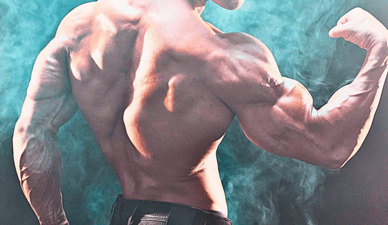 A male body builder flexes