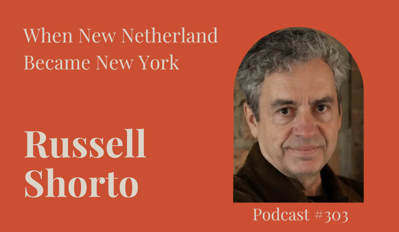 Russell Shoroto is a middle-aged white man with brown eyes and grey curly h