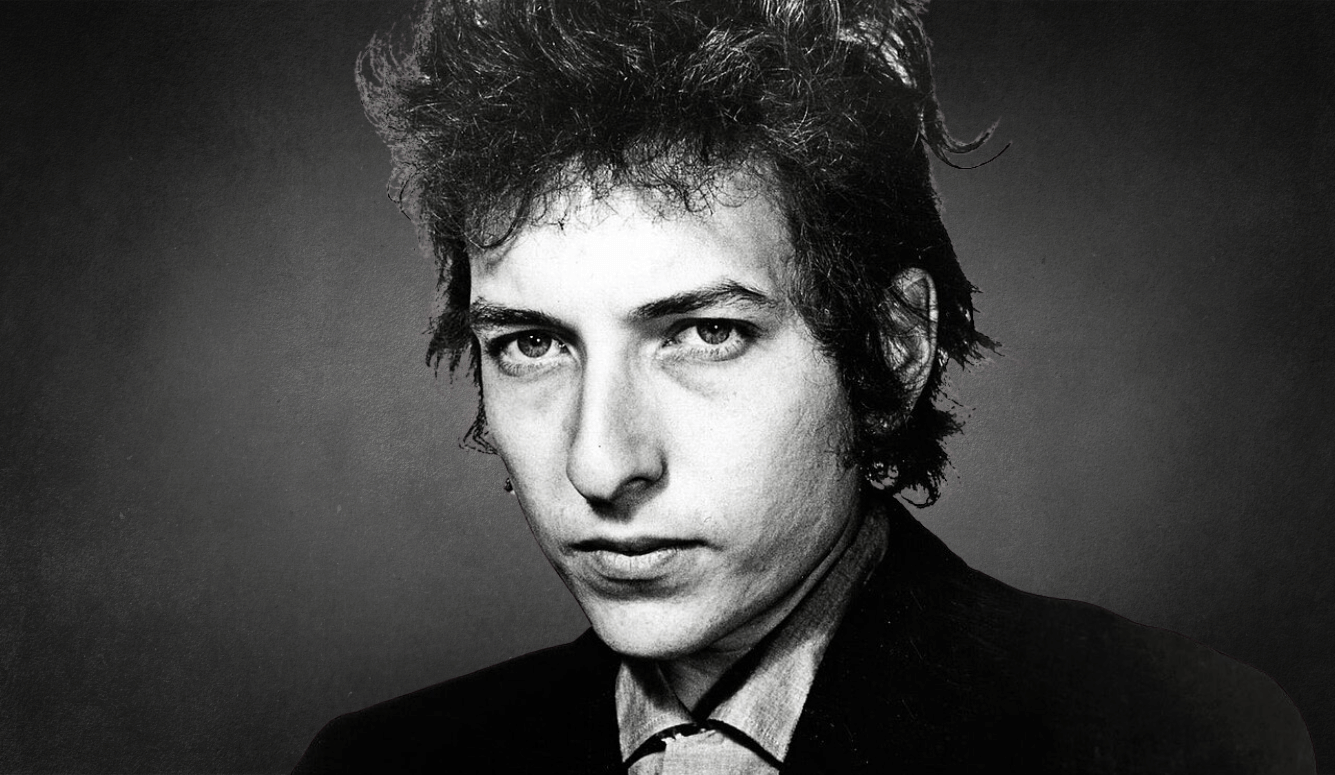 Bob Dylan as a young man. Blackand-white headshot.  