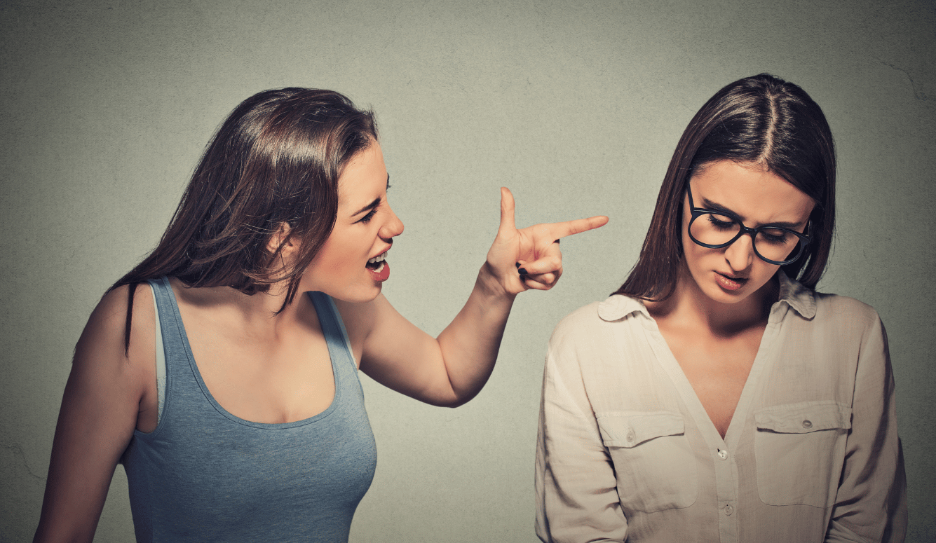 Girl bullying another
