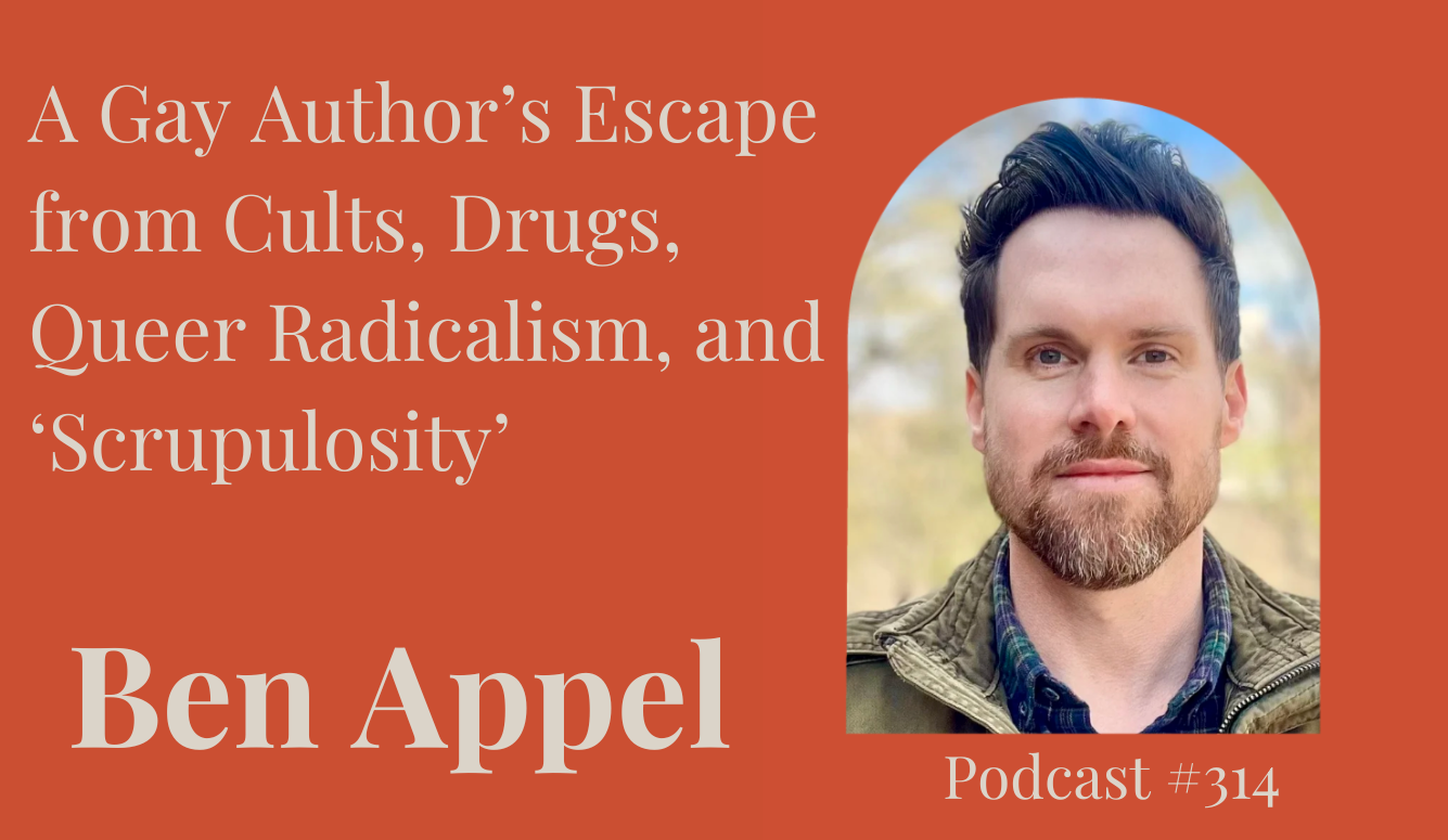 Headshot of a Ben, a whil man with short dark hair and a beard, wearing a collared shirt and jacket against a blurred outdoor background.