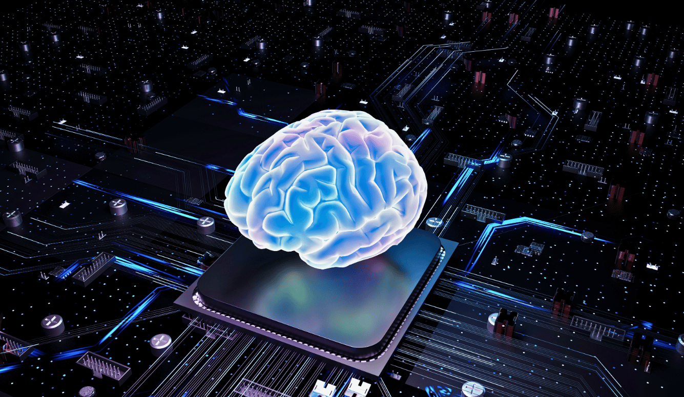 Glowing blue holographic human brain resting on a computer processor chip, surrounded by a dark circuit board with illuminated blue pathways. 