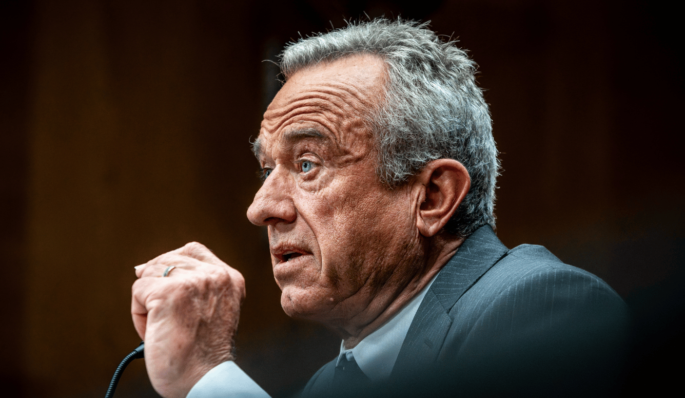 RFK Jr speaks into microphone